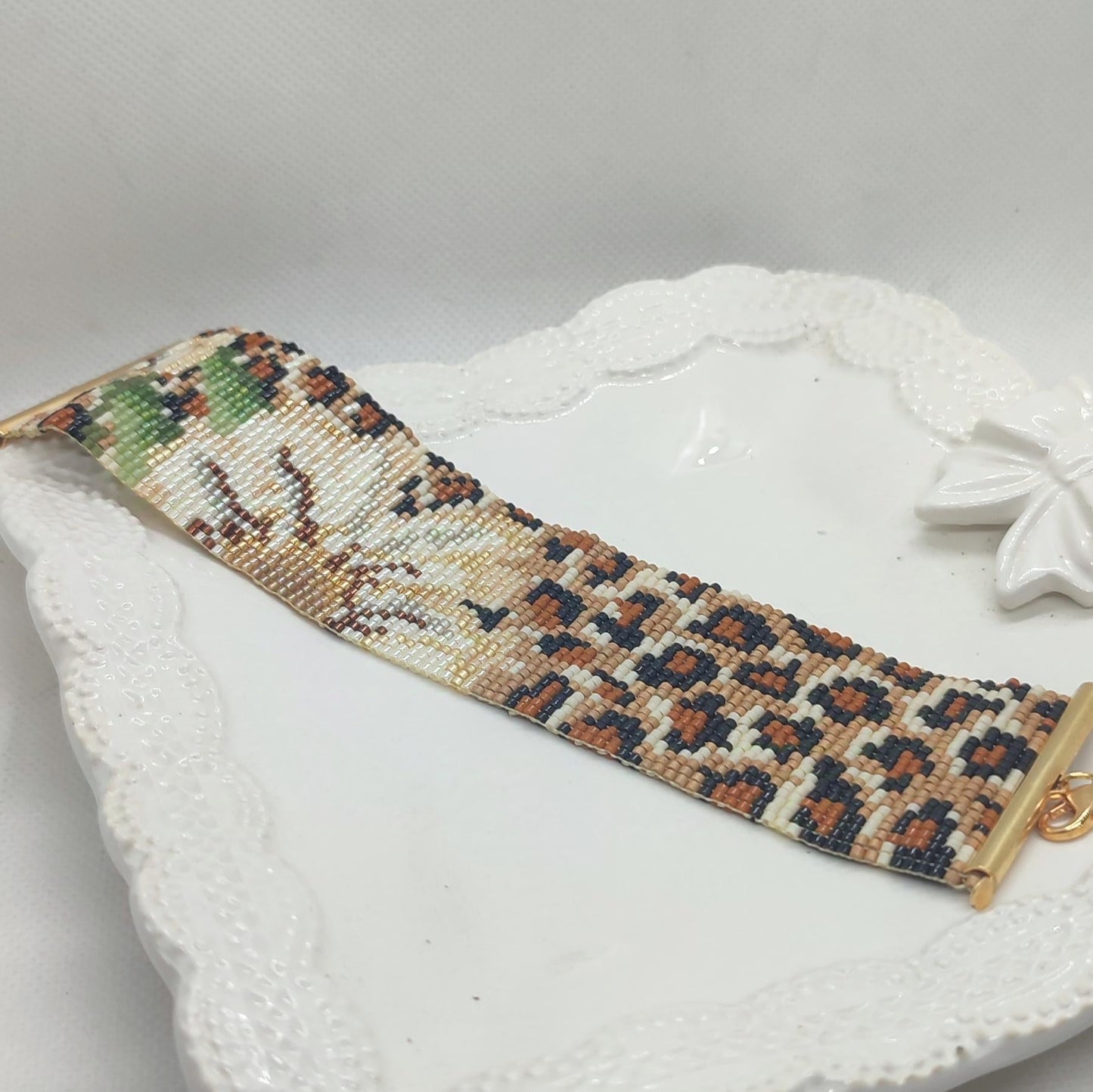 Bracciale a polsino floreale - animalier in vendita su Petali e Passioni Bijoux