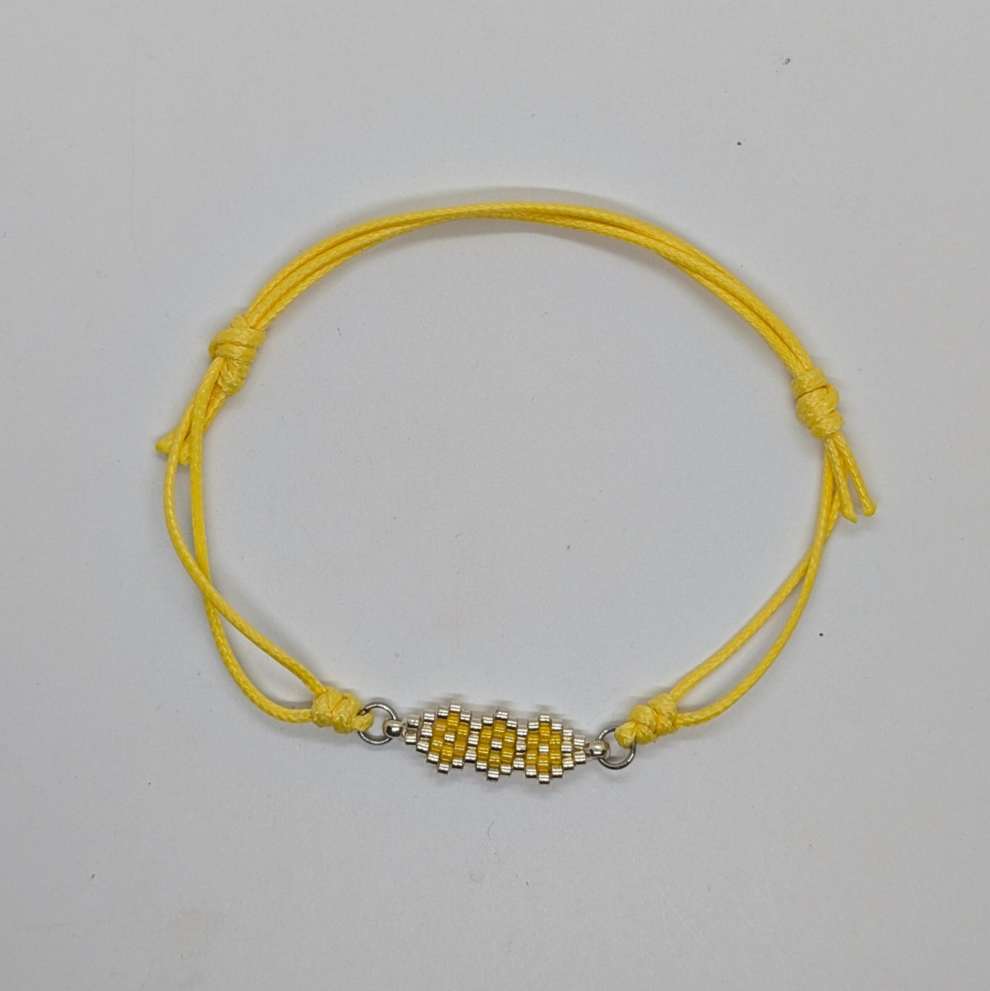 Bracciale a cordino giallo