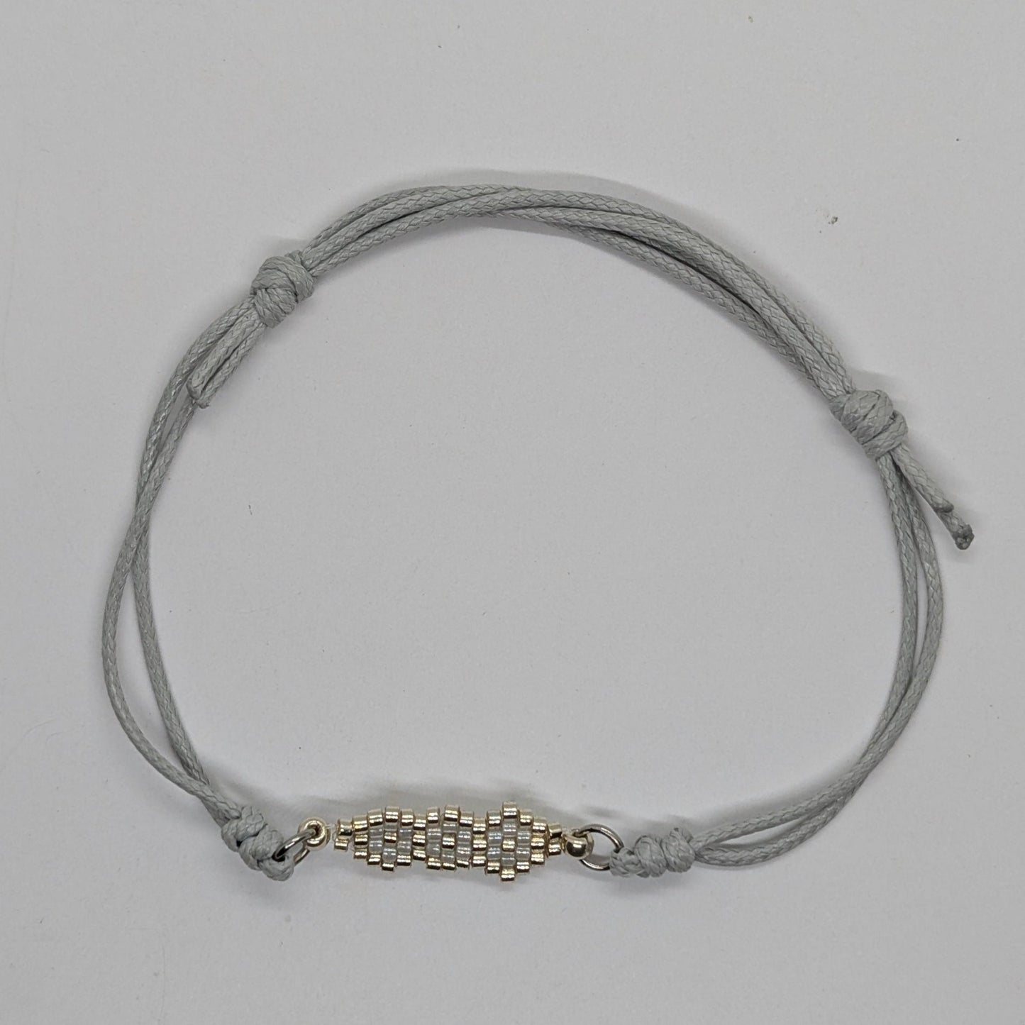 Bracciale a cordino grigio