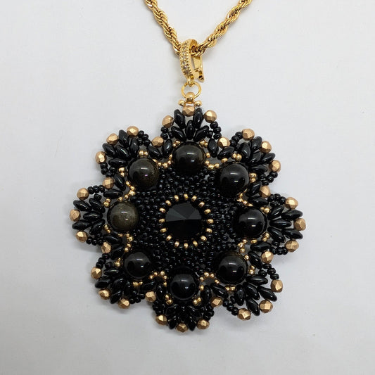 Collana con Medaglione - PASSIFLORA Ossidiana dorata in vendita su Petali e Passioni Bijoux