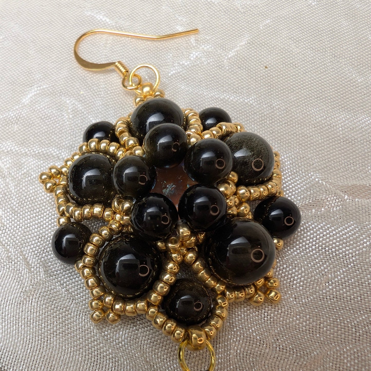 Orecchini SHALIMAR - Ossidiana dorata in vendita su Petali e Passioni Bijoux